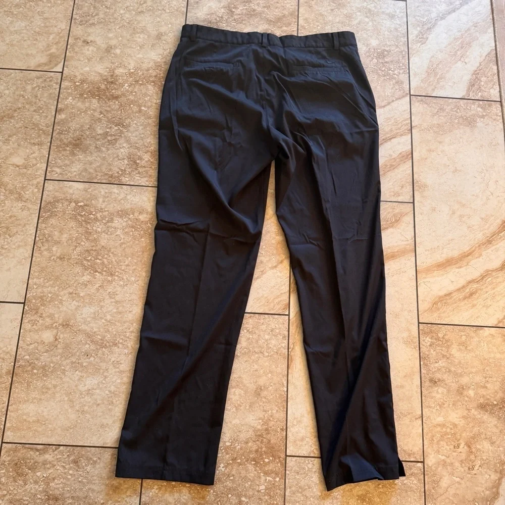 Nike Dri-Fit pants 95% Polyester 5% Spandex Black color Vented cuffs belt loops‎